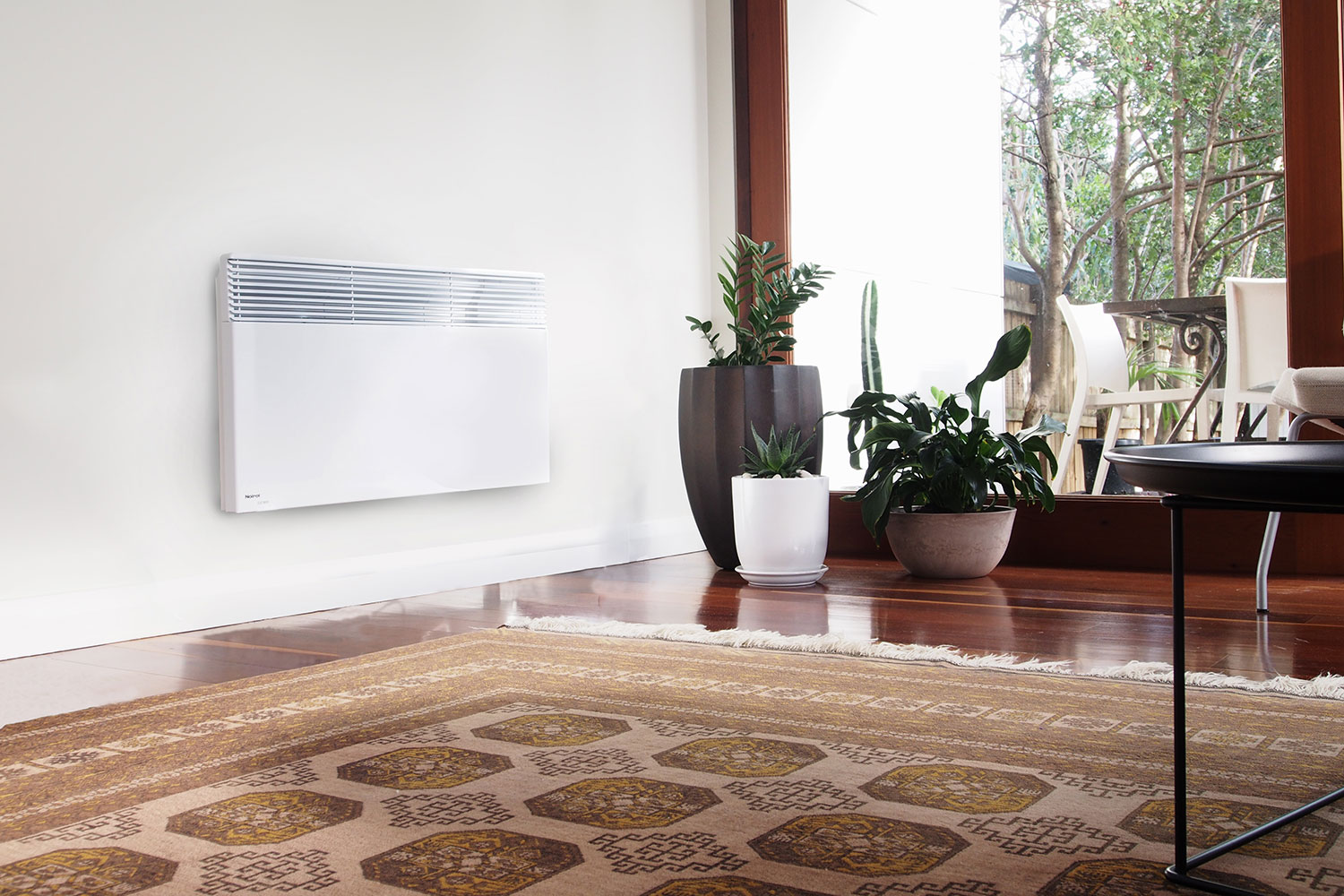 noirot panel heater mounted in living room